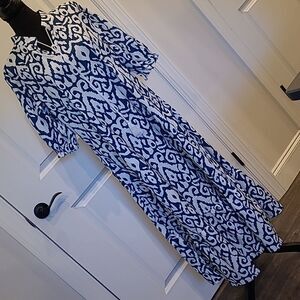 Maxie tiered 100% poly dress with neckline ties with tassels